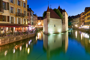 Annecy Haute Savoie France. The Palais de lIsle and Thiou river at sunset