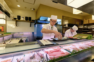 Japan. Tokyo. Preparing sushi in a sushi bar in Shibuya district