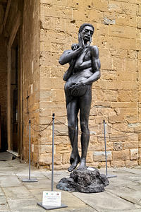 Città della Pieve Umbria Italy. Tentazione dAdamo Temptation of Adam statue by Wolfgang Alexander Kossuth 1995