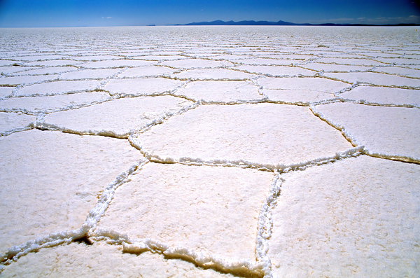 Expansive white salt flat with geometric patterns. Print