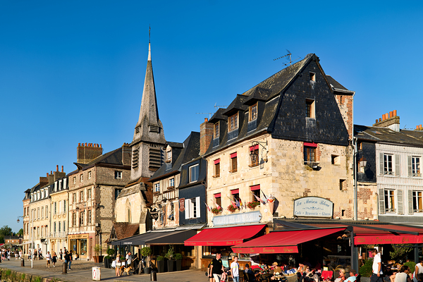 Restaurants and cafe along the harbour in Honfleur Normandy Fran by Marco Brivio
