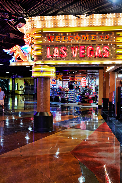 Visit Las Vegas sign near MGM Grand Hotel at night by Marco Brivio