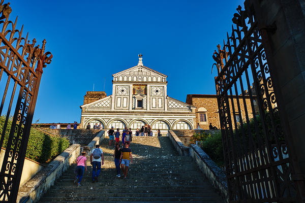 Visitors walk up the stairs to Basilica di San Miniato in Floren Print