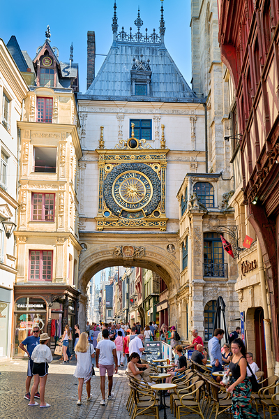 Visitors enjoy the historic Le Gros Horloge in Rouen Normandy by Marco Brivio