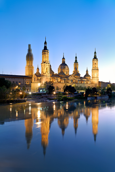 Zaragoza. Saragossa. Aragon. Spain. Cathedral Basilica of Our Lady of the Pillar and river Ebro at sunset Print