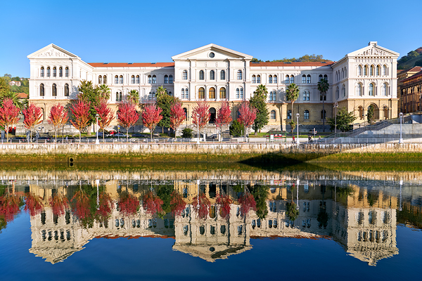University building reflects in water in Bilbao Spain Digital Download