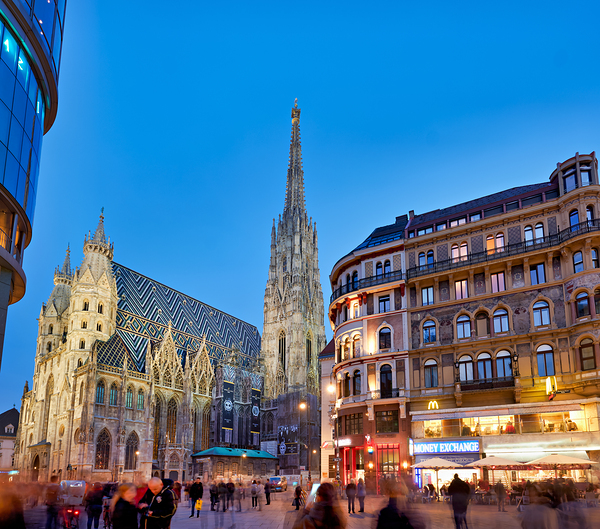St. Stephens Cathedral at dusk in bustling Vienna. Print