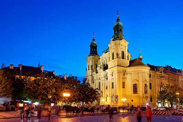 Illuminated church and lively square at night. Digital Download