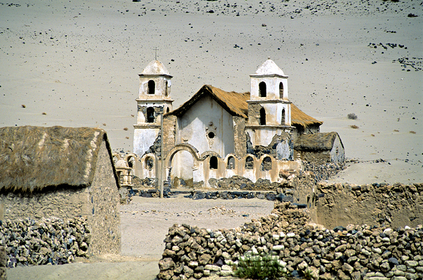 Dilapidated church and stone buildings in a barren desert landsc Digital Download