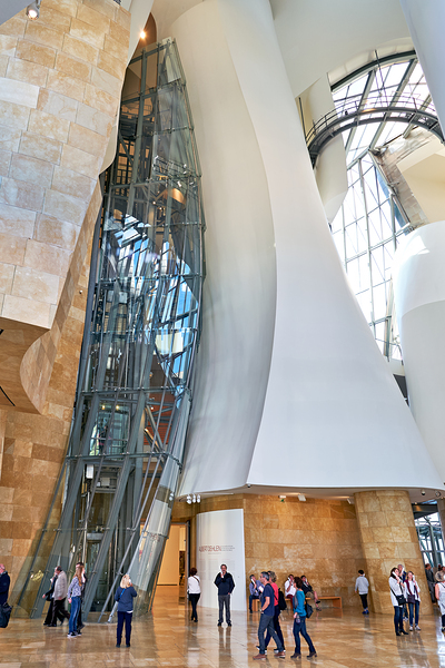 Visitors explore the interior of the Guggenheim Museum in Bilbao Digital Download