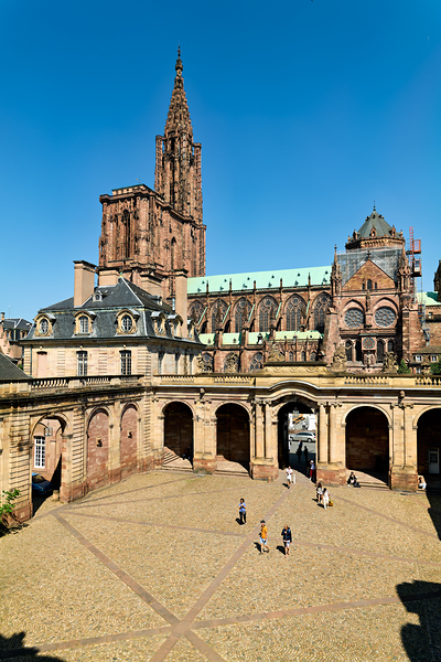 Visitors stroll in Palais Rohan courtyard view Strasbourg Cathe by Marco Brivio