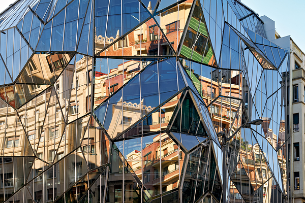 Modern building reflects city life in Bilbao Spain Print