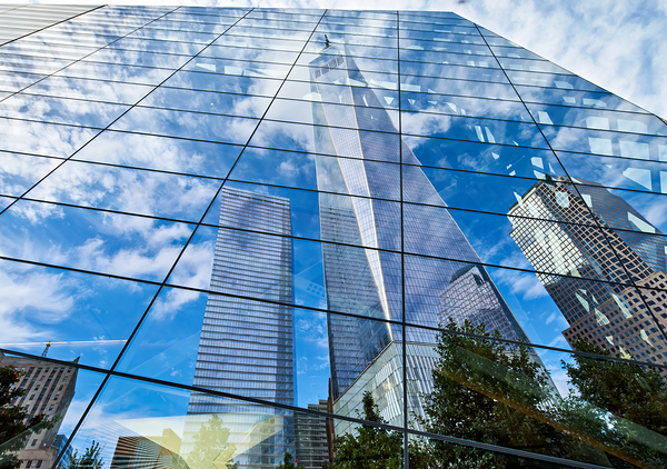 Reflections of one world trade center in manhattan Print