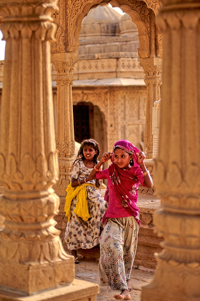 Girls playing in Jaisalmer Rajasthan during the evening light Print