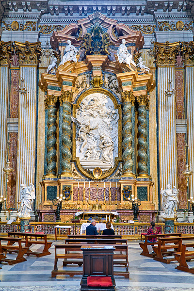 Visitors at the altar of Church of St. Ignatius of Loyola in Rom Print