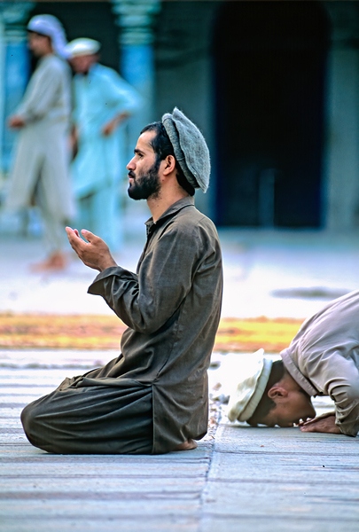 Prayers in the mosque of Chitral Pakistan at sunset Print