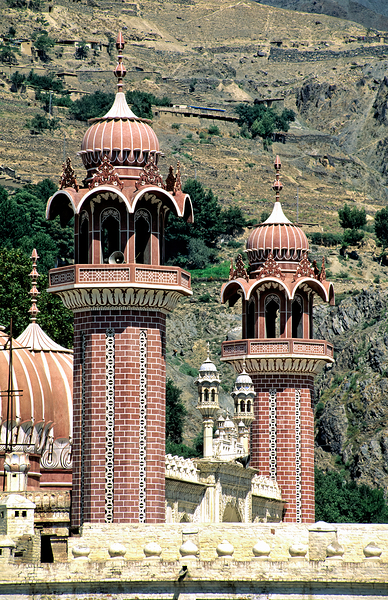 Mosque towers stand tall in Chitral Pakistan on a clear day Print