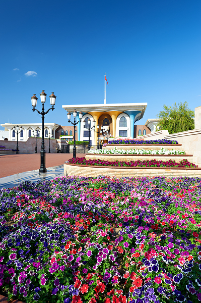 Al Alam Palace with colorful flowers in Muscat Oman by Marco Brivio