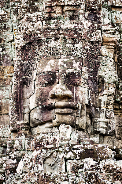 Ancient Khmer stone face Bayon temple. Print