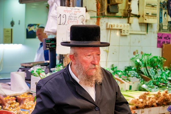 Elderly man in Mahane Yehuda Market in Jerusalem during a busy d Print