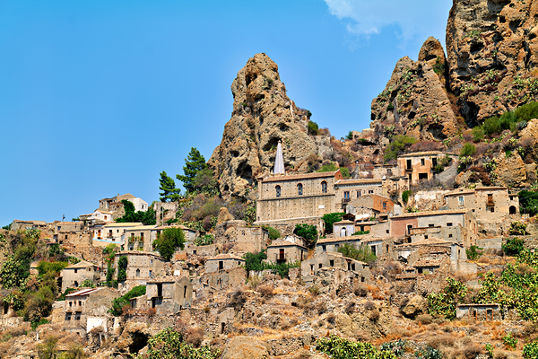 Pentedattilo in Calabria shows old buildings and rocky cliffs Print
