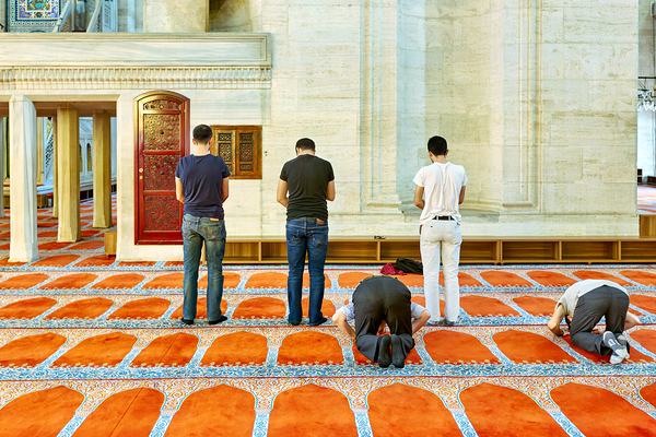 People pray inside Suleymaniye Mosque in Istanbul Turkey Print