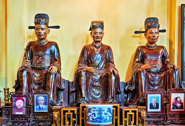 Wooden statues in Hanois cultural shrine showing local history Print