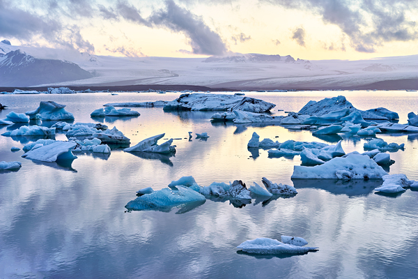 Midnight at jokulsarlon glacier lagoon in iceland by Marco Brivio