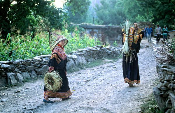 Women working in Bumburet Valley Kalash village Print
