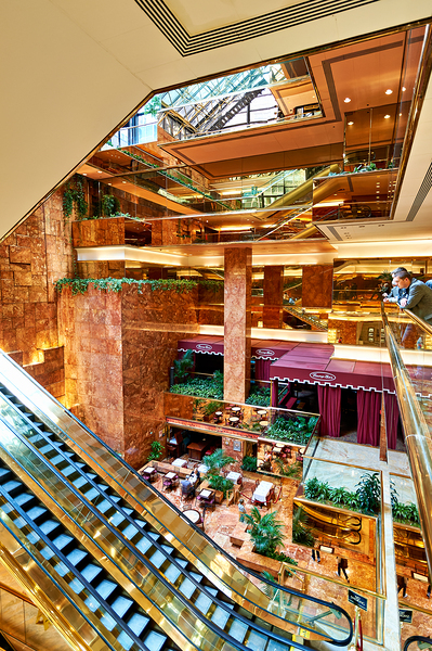 Visitors explore the Trump Tower Atrium in Manhattan New York Print