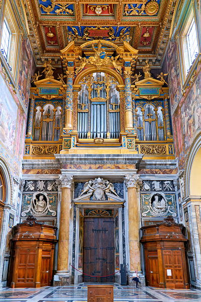 Daytime view of Romes cathedral interior with organ by Marco Brivio