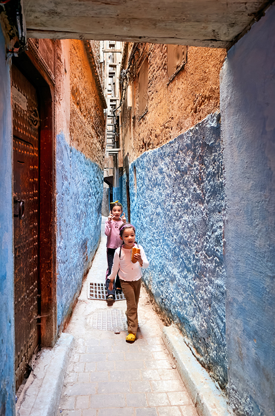 Children play in the alleys of the Medina in Fez Morocco Print