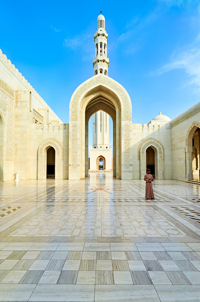 Visitors explore Sultan Qaboos Grand Mosque in Muscat Print