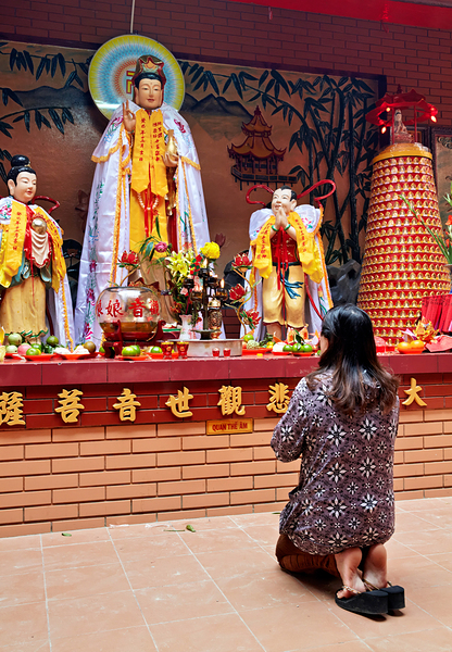 Prayer at Buddhist shrine in Ho Chi Minh City Vietnam Digital Download