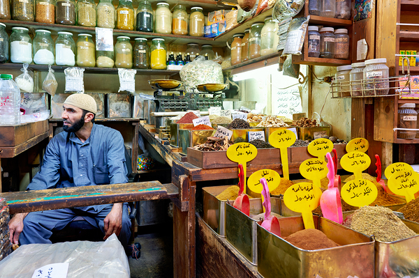 Market scene in Al Hamidiyah Souq showing spices and vendor in S Digital Download
