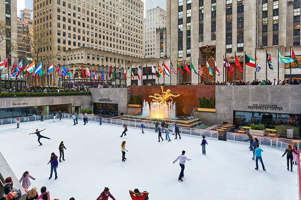 Ice skaters enjoy the rink at Rockefeller Center in Manhattan by Marco Brivio