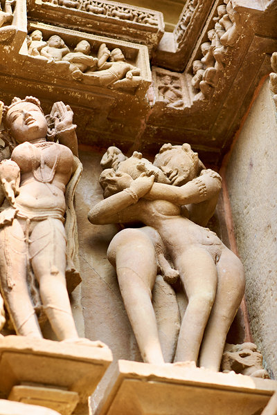 Hindu temples in Khajuraho display intricate erotic carvings Print