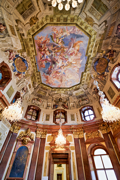 Grand baroque hall with elaborate ceiling fresco and crystal cha Print