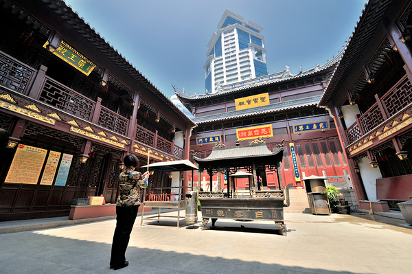 Incense offered at a Chinese temple courtyard in Shanghai Print
