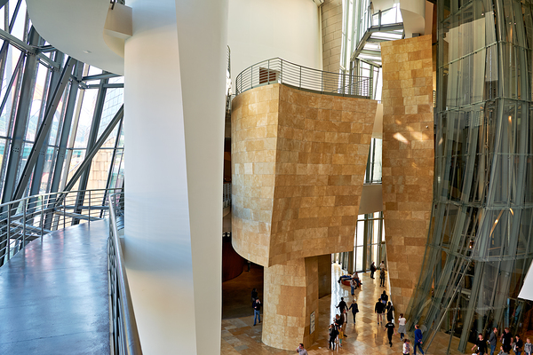 Inside Guggenheim Museum in Bilbao Spain with visitors walking Digital Download
