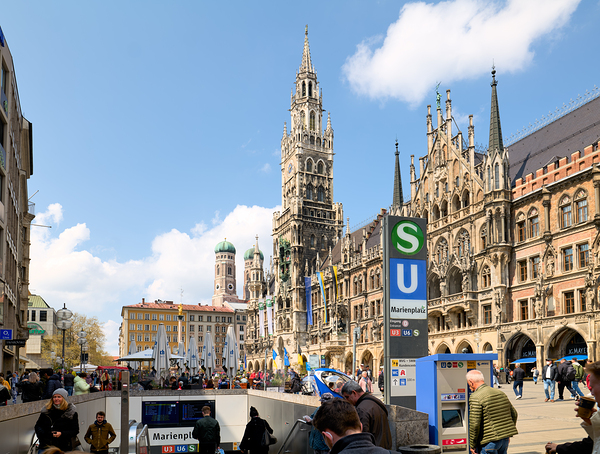 Busy day at Marienplatz with Rathaus and subway entrance in Muni by Marco Brivio