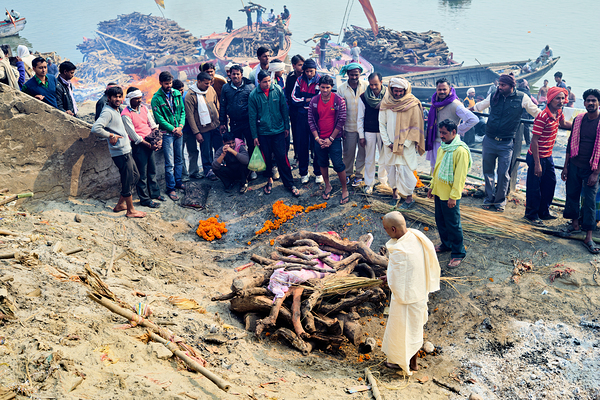 Cremation rites by the Ganges River in Varanasi India Print