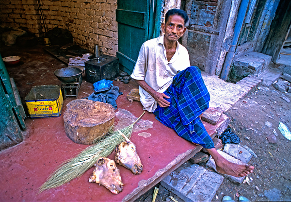 Street butcher working in Lahore during daytime hours Print