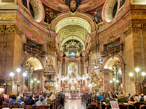 People attending a Requiem service in an ornate church. Print