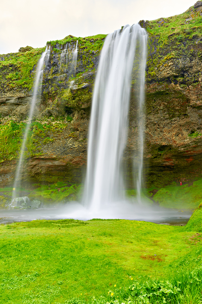 Seljalandsfoss waterfall shows its height in Iceland by Marco Brivio