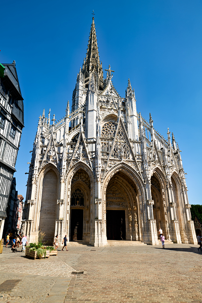 Saint Maclou church in Rouen Normandy with clear blue sky by Marco Brivio