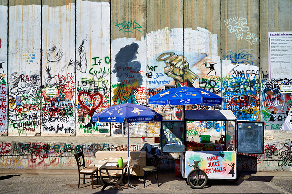 Separation wall in Bethlehem with a juice stand near graffiti Digital Download