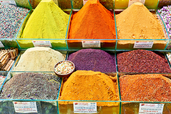 Exploring the Grand Bazaar with colorful spices in Istanbul Print