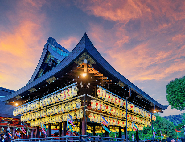 Yasaka shrine in Kyoto with lanterns during sunset Print