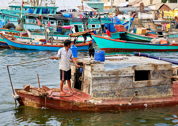 Fishing boat on water in Phu Quoc Vietnam during the day Print